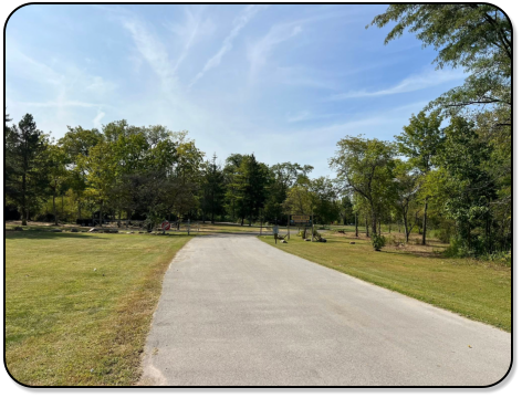 Picninc table near the pond at M & M Outdoors Campground.